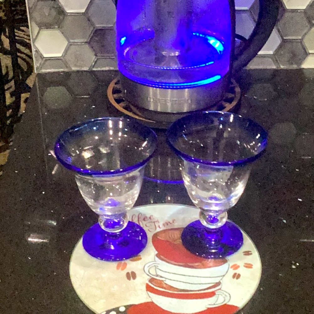 2  6 Oz Blue Tinted Glasses. Perfect for your favorite ice cream